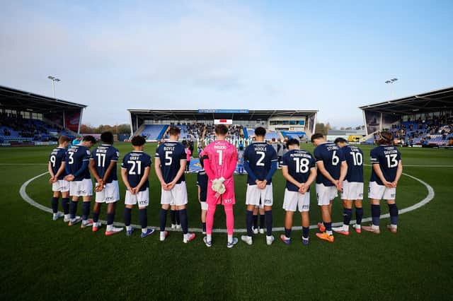 Shrewsbury Town came together before kick-off to mark Remembrance