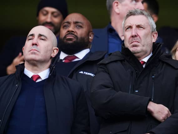 Manchester United chief executive officer Omar Berrada (left) and director of football Jason Wilcox in the stands at Stamford Bridge