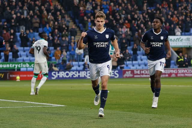George Lloyd celebrates after scoring to make it 1-1