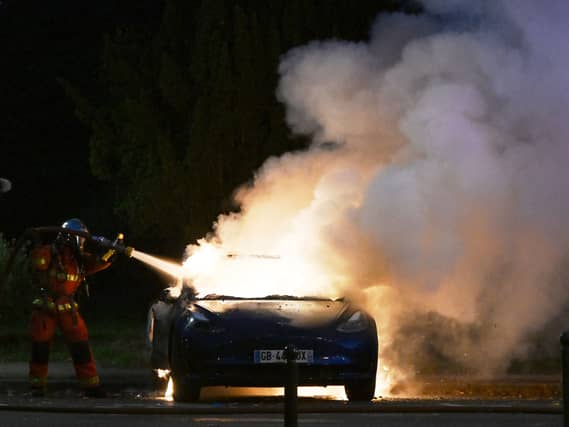 A car on fire in Paris