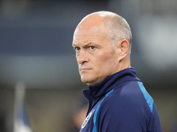 Millwall manager Alex Neil looks on