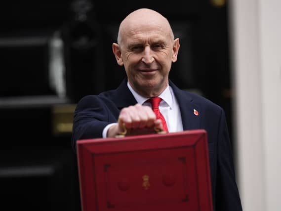 John Healey outside 11 Downing Street