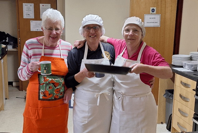 Roarians Marjorie Booth, Anne De Vere and Robyn Davies cooking up a storm