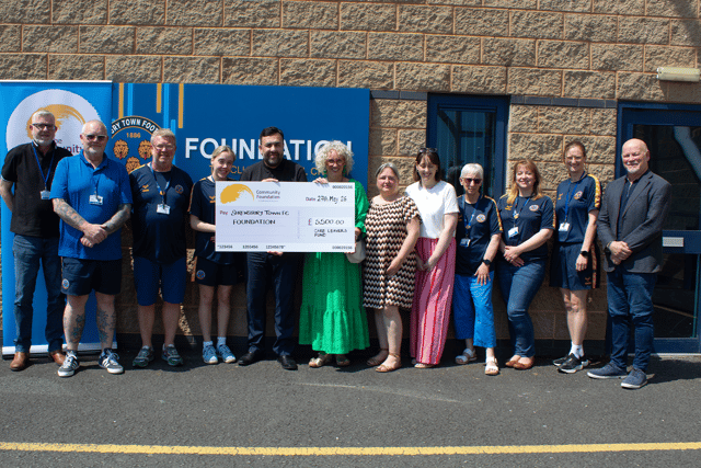 The Community Foundation presenting the cheque to Shrewsbury Town FC.