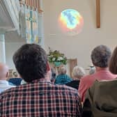 Audience watches the People's Emergency Briefing 