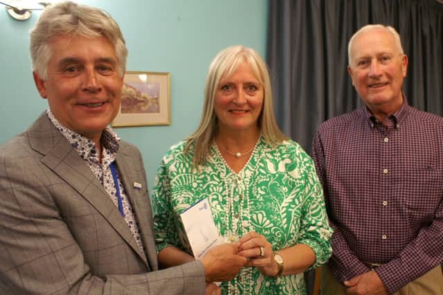 Gareth (right) in his role as secretary with fellow Rotarians Johnathan Callwood and Joycelin Hoyland.