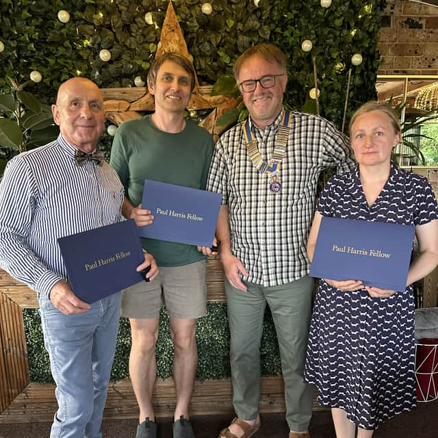 Steve Jerman presents the Paul Harris awards to Andy Boroughs, (left) Alex, Steve Jerman & Mila from Shropshire Supports Ukraine.