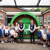 L-R Bradford Estates construction director Graham Young and executive chairman Alexander Newport with school pupils from St Mary's CE First Academy