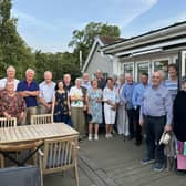 Borderland Rotary members and friends gather outside the Boathouse on a beautiful summers evening