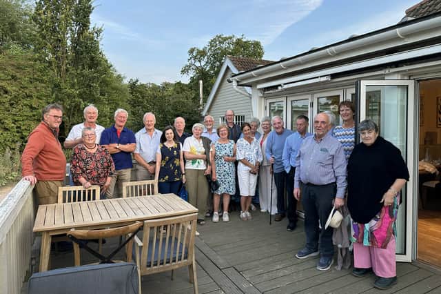 Borderland Rotary members and friends gather outside the Boathouse on a beautiful summers evening
