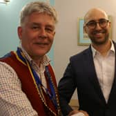 President Johnathan Callwood inducts Aidan France into Shrewsbury Severn Rotary Club