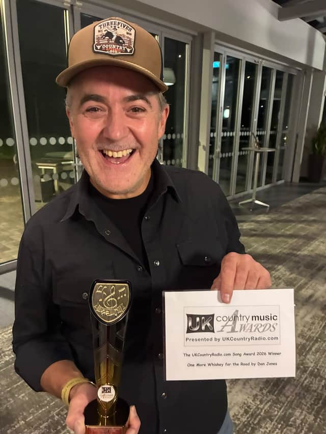 Dan showing off his award back stage.