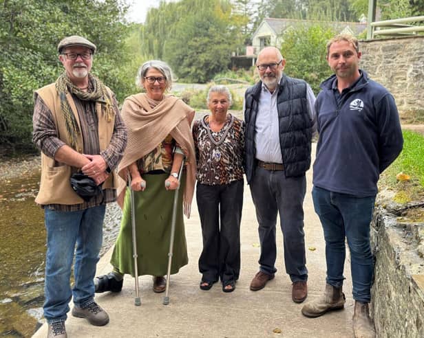 From left: Trustees Ric Tyler and Silvia Geissbauer, Mayor Diane Lyle, Trust secretary Richard Bowen, contractor Stuart Woodhouse