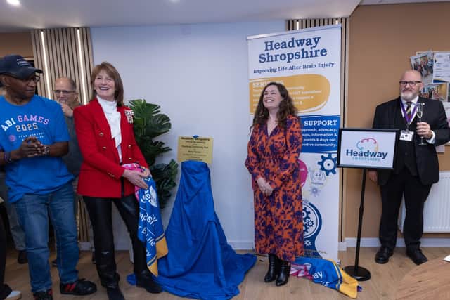 His Majesty’s Lord-Lieutenant of Shropshire, Mrs Anna Turner JP, unveils a commemorative plaque to mark the official opening of the newly refurbished Headway Hub in Shrewsbury.
