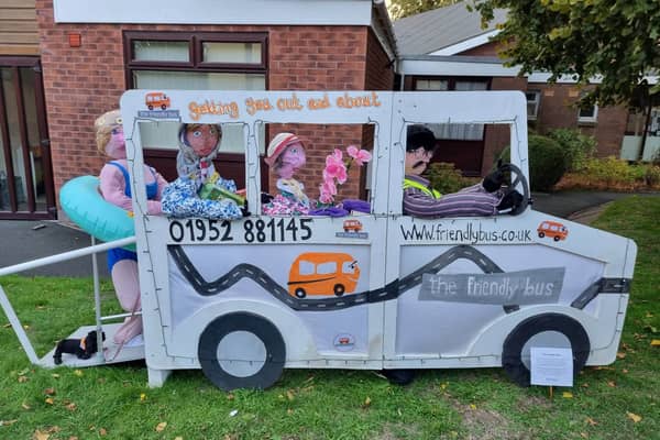 The 'Let's Get Together' group's entry to the travel themed scarecrow competition!