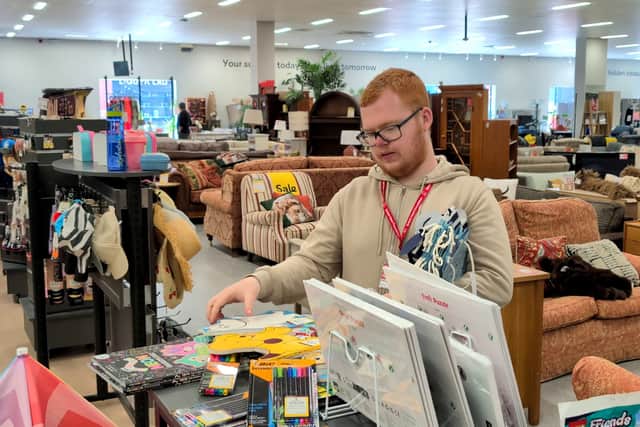 Taylor volunteering at the British Heart Foundation store in Telford.