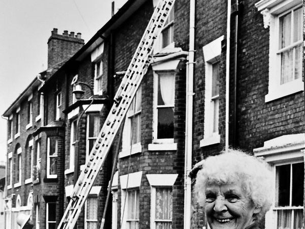 Bessie Roberts, aged 83, outside her damaged home in Victoria Street, Castlefields, Shrewsbury, in 1990.