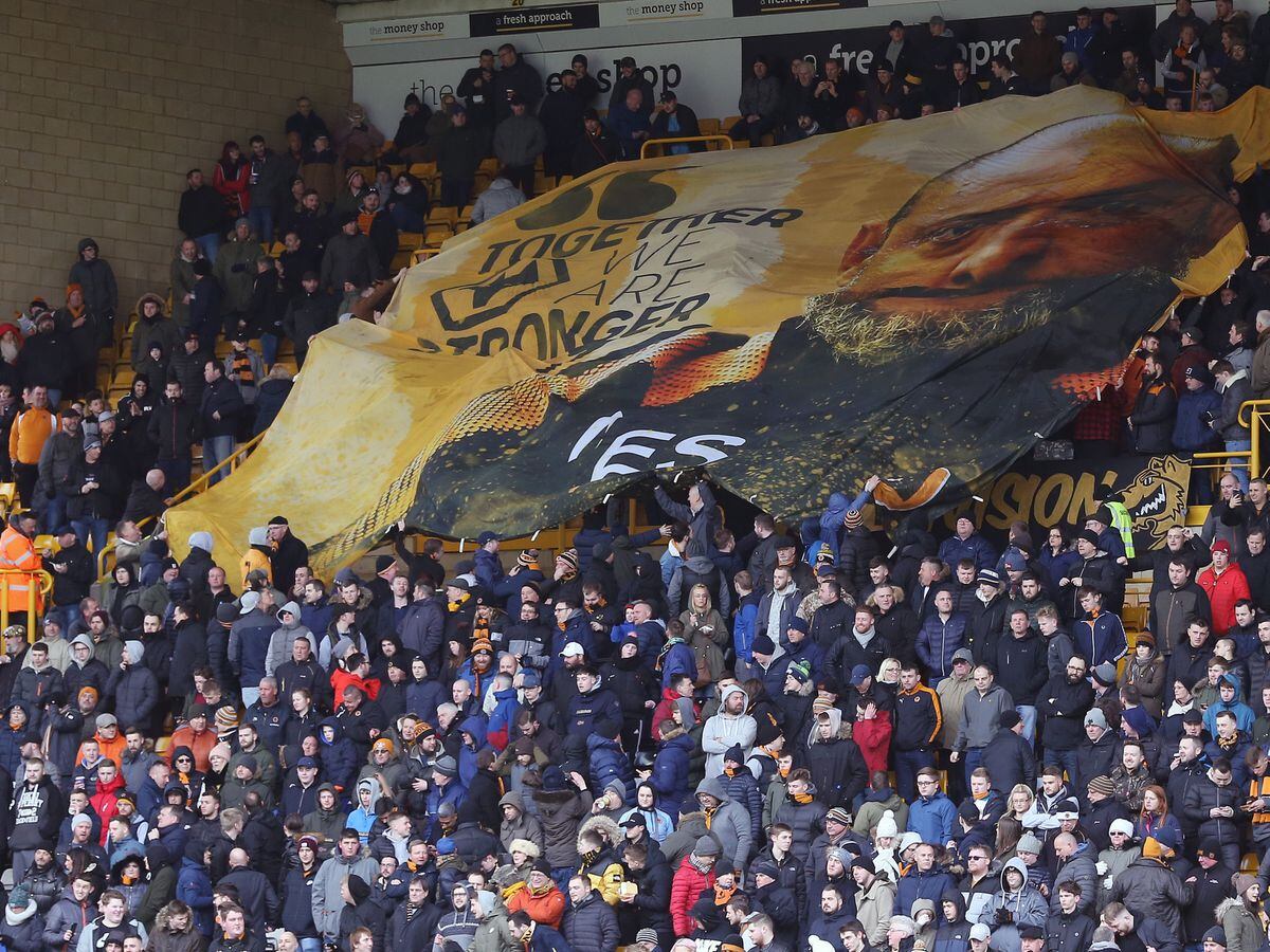 'Together we are stronger' banner in the South Bank at Molineux Stadium.