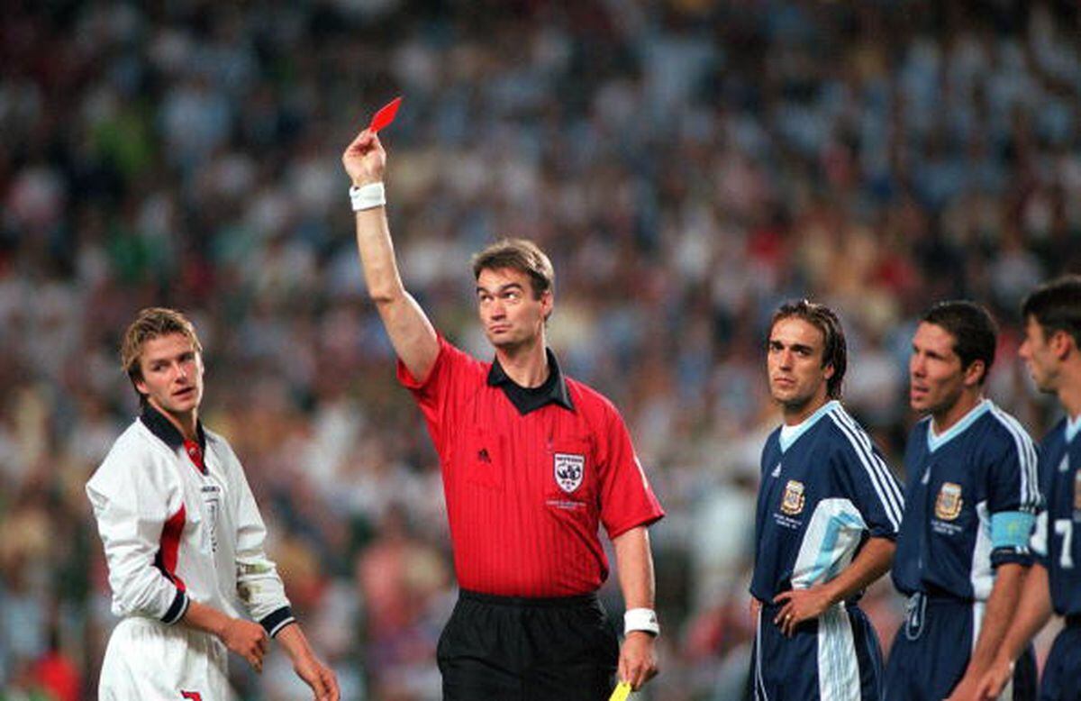 David Beckham shown the red card for kicking Diego Simeone