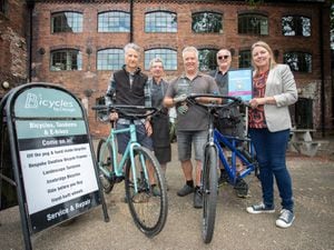 Councillor Carolyn Healy, right, with the Bicycles by Design team who were named as one of the Ironbridge High Street Heroes in summer 2023