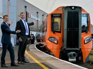 West Midlands Mayor Andy Street with West Midlands Trains' managing director Ian McConnell and the new train – named after Charles Darwin.