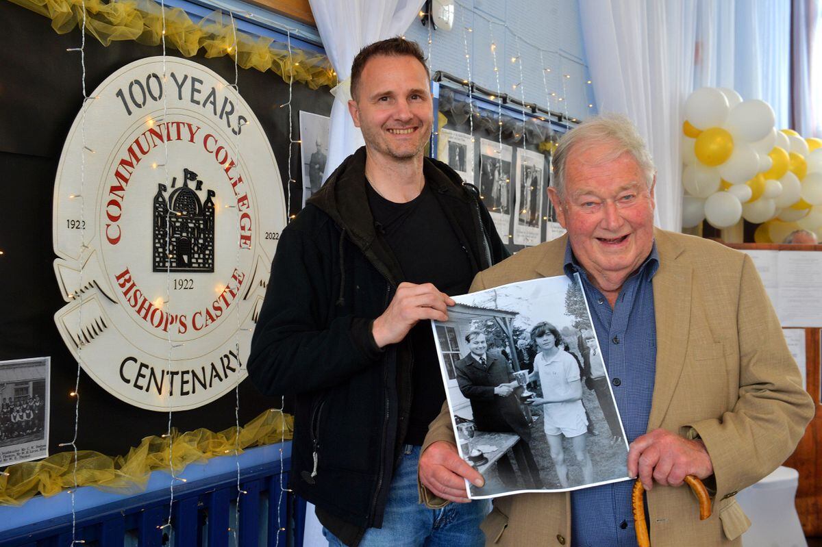 Current head Reuben Thorley with David Preshous, 85, who was head from 1973-1997. He is holding a photo of him from that time.