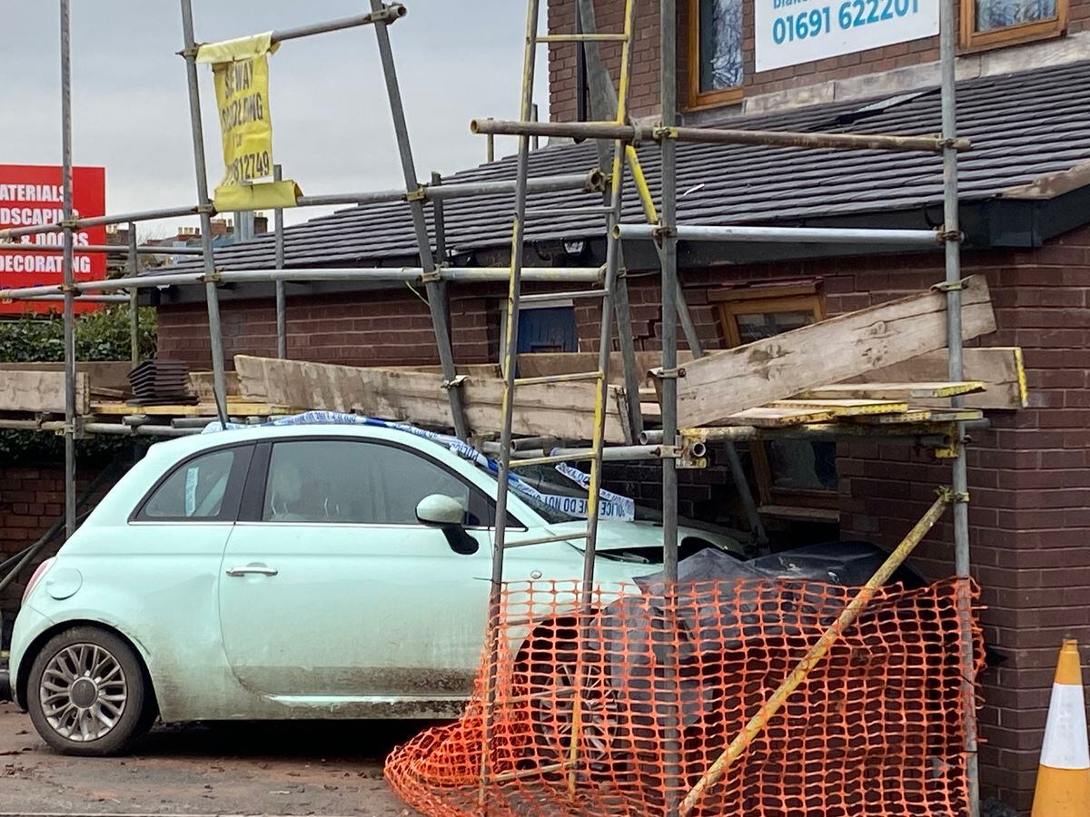 The car wedged into the wall of the veterinary surgery