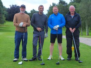 A team from Pave Aways warm up for the golf day in September.