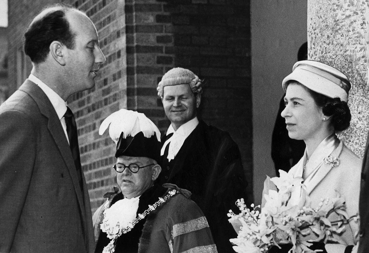 John Kenneally is introduced to the Queen during her 1957 visit to Dudley