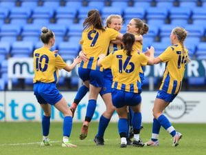 Vikki Owen of Shrewsbury Town Women celebrates after scoring a goal to make it 4-0.