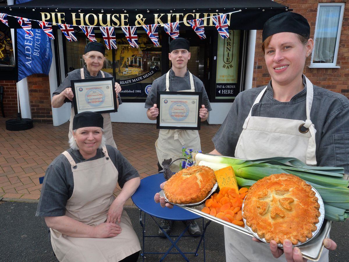 Lisa Wall shows off the award winning pies alongside her colleagues Mal Holland, Bradley Richards, Wendy Richards.