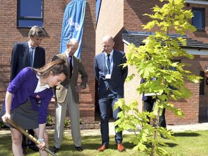 HRH the Duke of Kent planting a tree at the Noden’s Mews development as part of Stonewater’s commitment to plant five trees for each new home built, helped by Elise, a pupil from Leominster Primary School