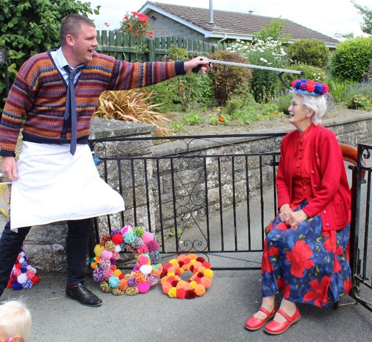 With Covid distancing Rita is "crowned" pom pom carnival queen in 2020, after 70 years helping with the town's carnival. 