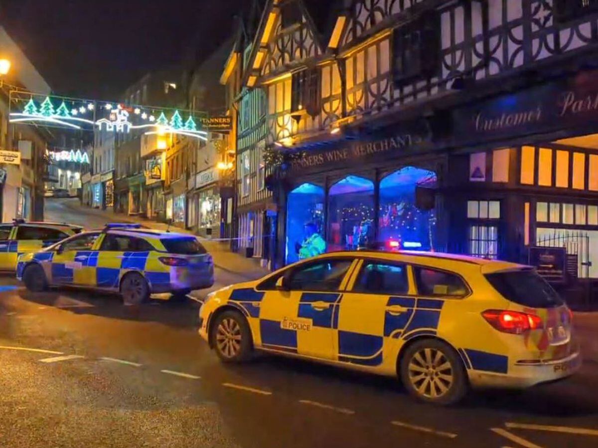 Police blocking off Wyle Cop, Shrewsbury, after the bomb threat - which later turned out not to be genuine - was made. Photo: Andrew Brady