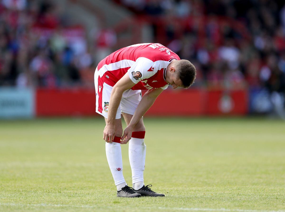Wrexham's Paul Mullin shows his dejection during the Vanarama National League semi-final match at The Racecourse Ground, Wrexham. Picture date: Saturday May 28, 2022. PA Photo. See PA story SOCCER Wrexham. Photo credit should read: Bradley Collyer/PA Wire. ..RESTRICTIONS: Use subject to restrictions. Editorial use only, no commercial use without prior consent from rights holder..
