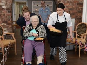 Jodie Driver and Steffi Pritchard pancake racing with resident Ruth Harsum