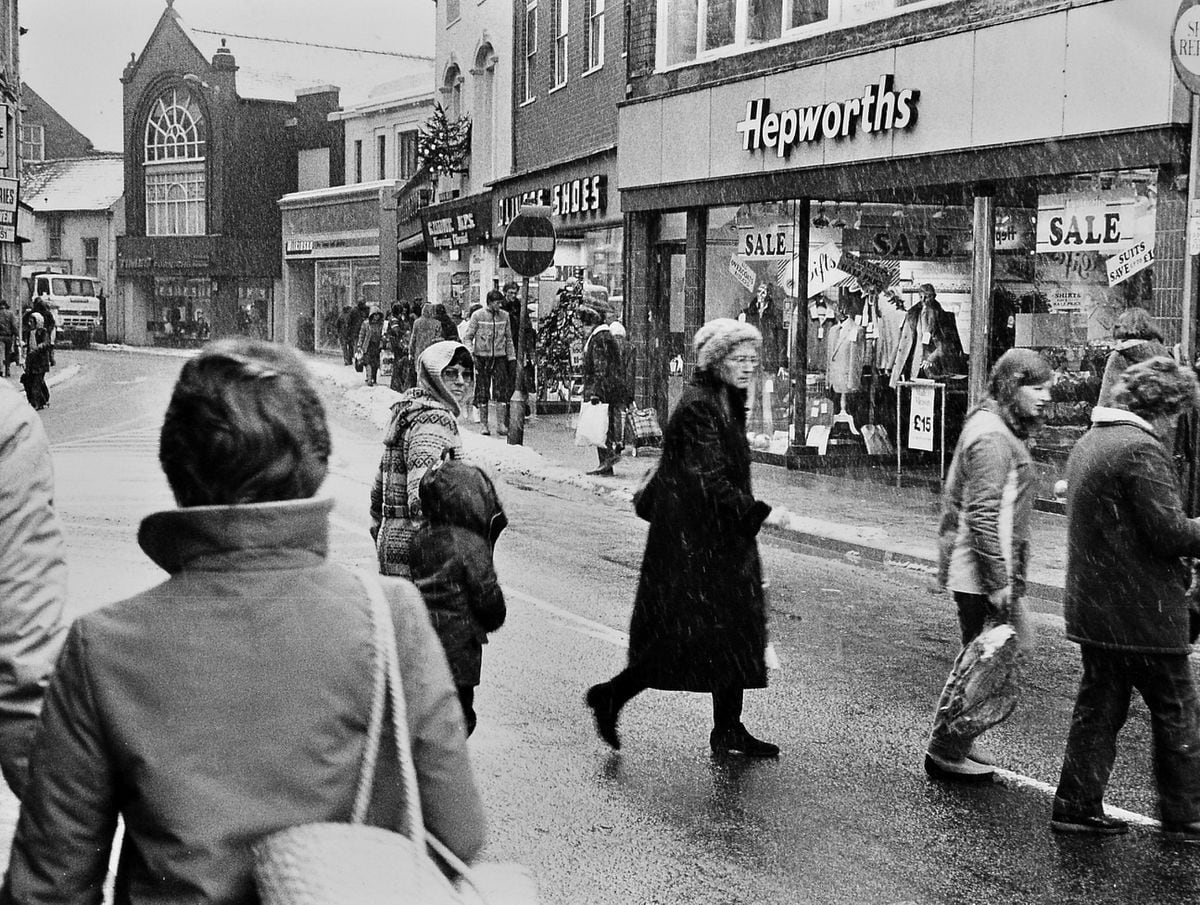 This photo was first published exactly 40 years ago in the Star, with the caption: "Shoppers in Oswestry brave the blizzard conditions to buy their last minute Christmas shopping." It's not showing up much on the picture, but snow really was falling at the time.