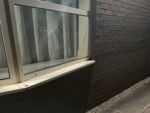 A member of staff found a brick next to the broken window. Photo: Donnington & Muxton Parish Council