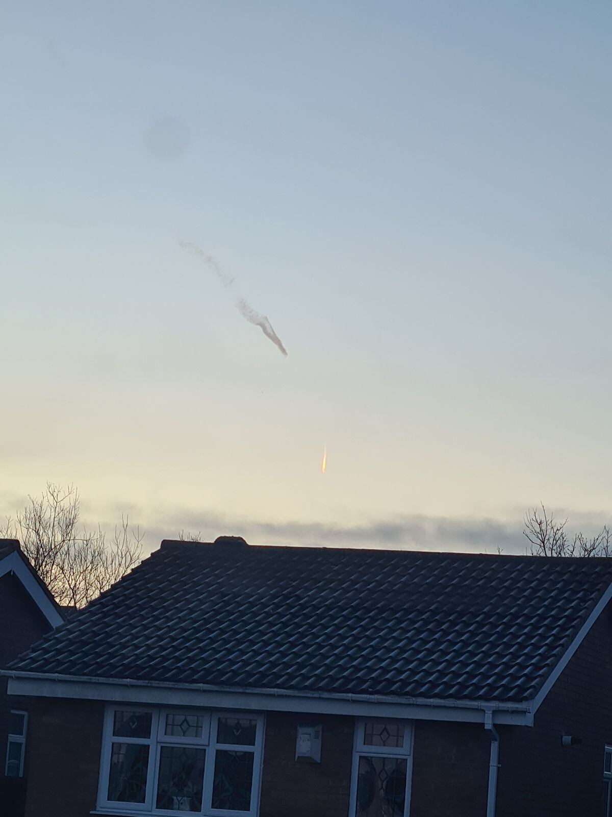 The black streak was seen alongside something glowing in the sky. Photo: Rebecca Mander.