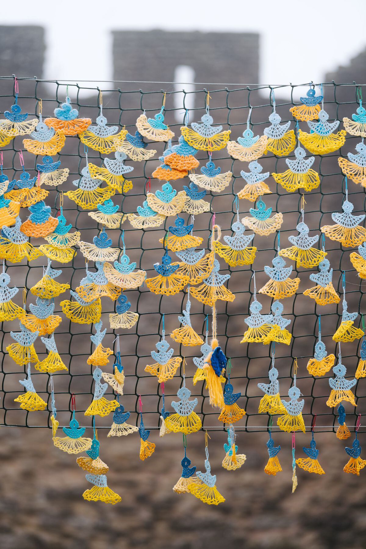 The artwork is made up of 500 hand-made angels, each representing a child killed in the war in Ukraine.