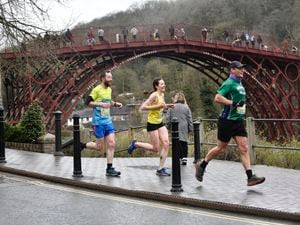 Runners in the Ironbridge Half Marathon passing through Ironbridge. Photo by David Bagnall