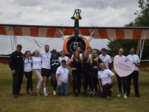 The wing walkers have raised more than £12,000 for Hope House.