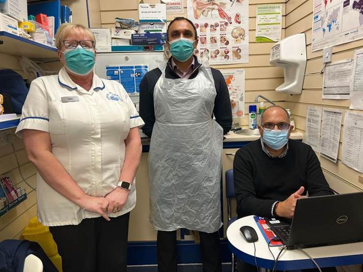 Pictured, from left, are Samantha Nightingale, lead vaccinator Sanjeev Samrai, pharmacy manager and director, and Mr Sarwan Samrai, director of the vaccination hub at Woodside Pharmacy. 