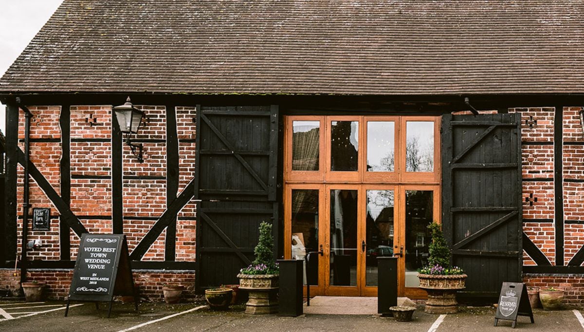 The tithe barn at the Hundred House Hotel is an award-winning wedding venue.