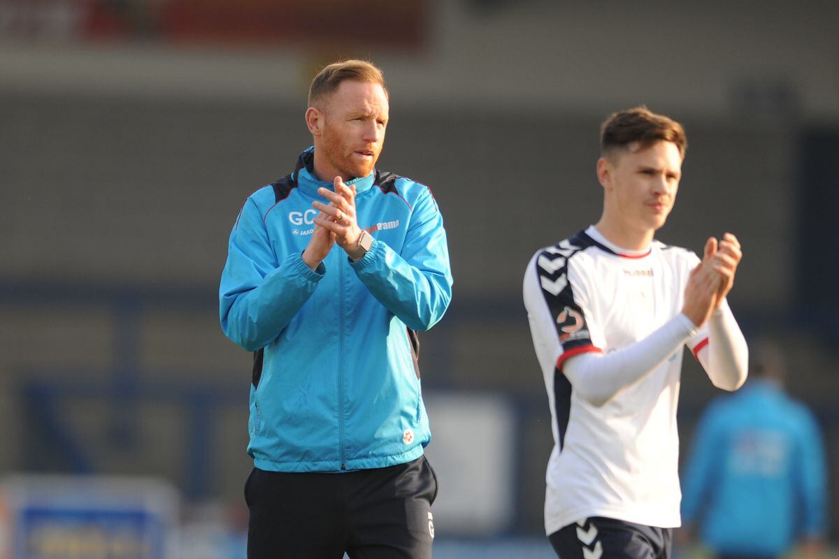 Disappointed Gavin Cowan applauds the fans at full time during the Vanarama National League North fixture between AFC Telford United and Blyth Spartans at the New Bucks Head.