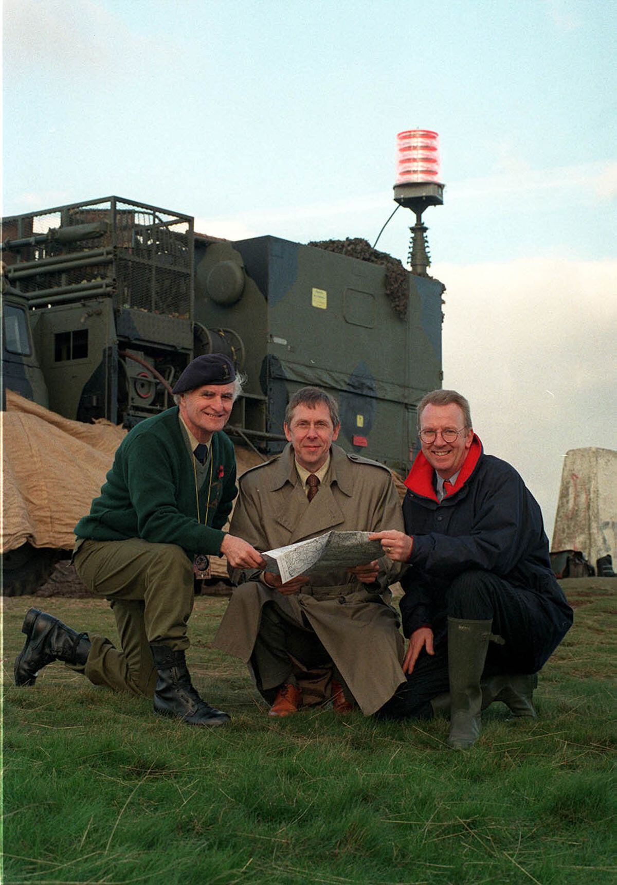 John, left, with a small test beacon on The Wrekin in 1998, accompanied by Michael Barker and Phil Hipkiss. 