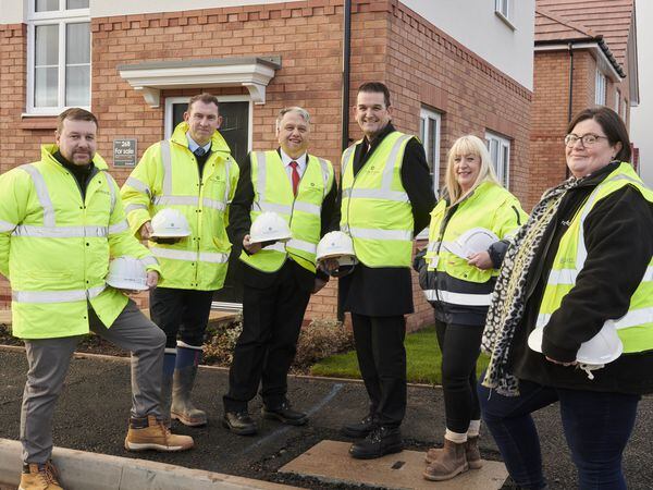 Handover of first affordable homes at Apley, Telford; from left, Simon Allen, Phil McHugh, Councillor Richard Overton, Councillor Paul Watling, Tracey Brewer and Emma Bannister 