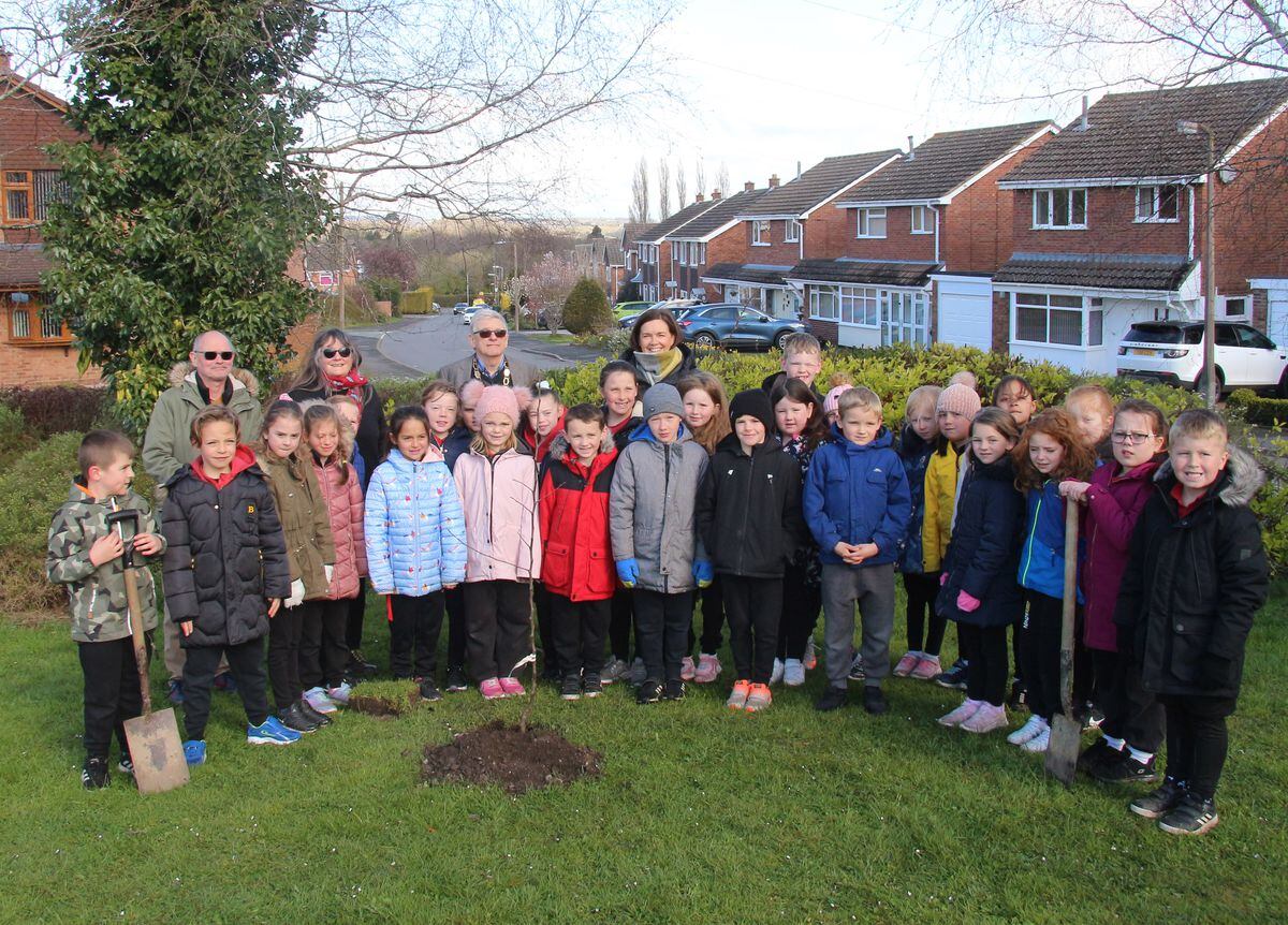 John Wilkinson School, Year 3 Children planting within Guest Road Play Area