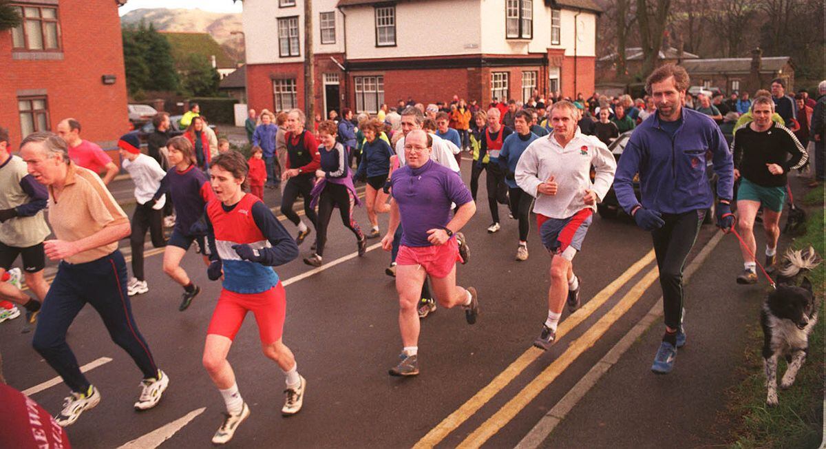 A large turnout of runners and walkers enjoyed bright weather conditions at the start of "The Morning After 1998" event in Church Stretton on New Year's Day in 1999. The runners endured a five mile hill run while the walkers completed a three mile family walk before enjoying soup and a roll at the Church Stretton and District Club afterwards. 
