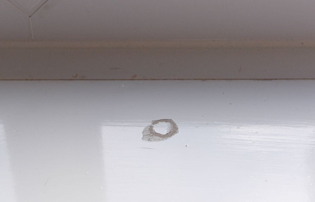 Holes in the paintwork on the windowsill